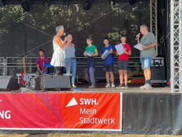 Siegerehrung_Erwachsenenturnier_Beate_Gellert_Veranstalterin_Iris_Mai_WIM_Flora_Greither_Ali_Jamali_Julian_Brückner_Andreas_Domaske